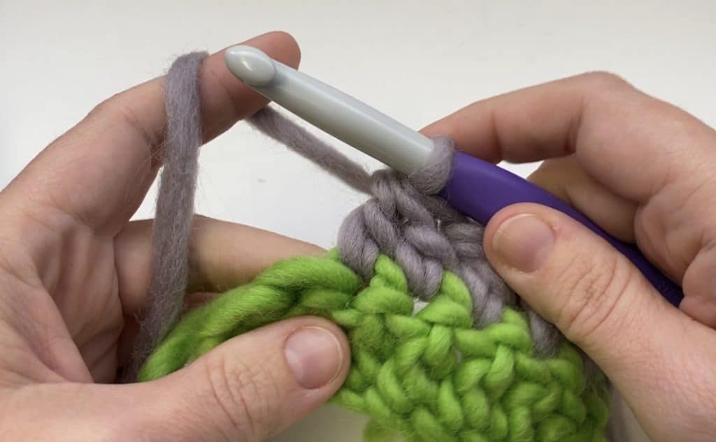 step five in a double crochet decrease