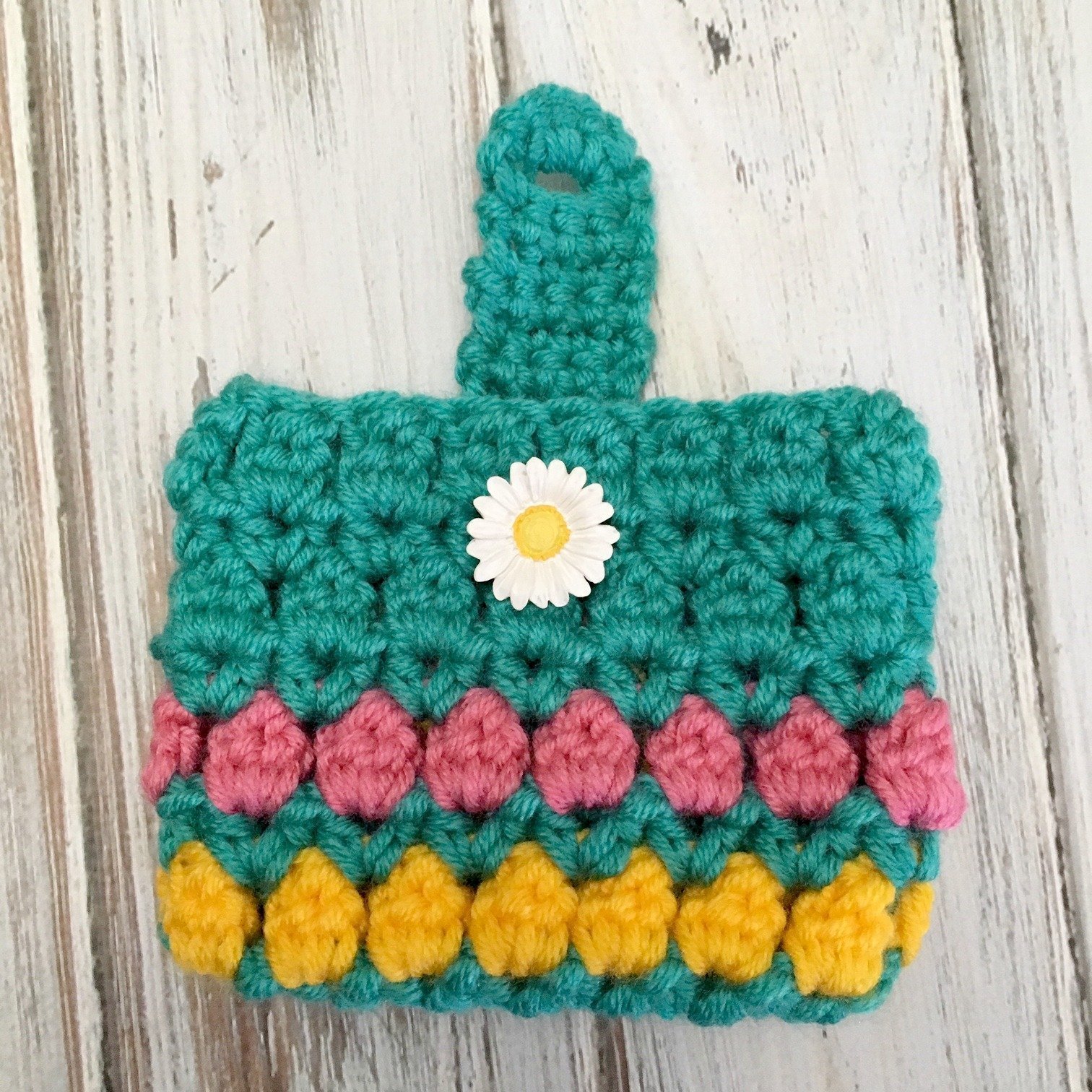 Learn to crochet this quick and easy project with the free pattern for the Summer Fun Coin Purse