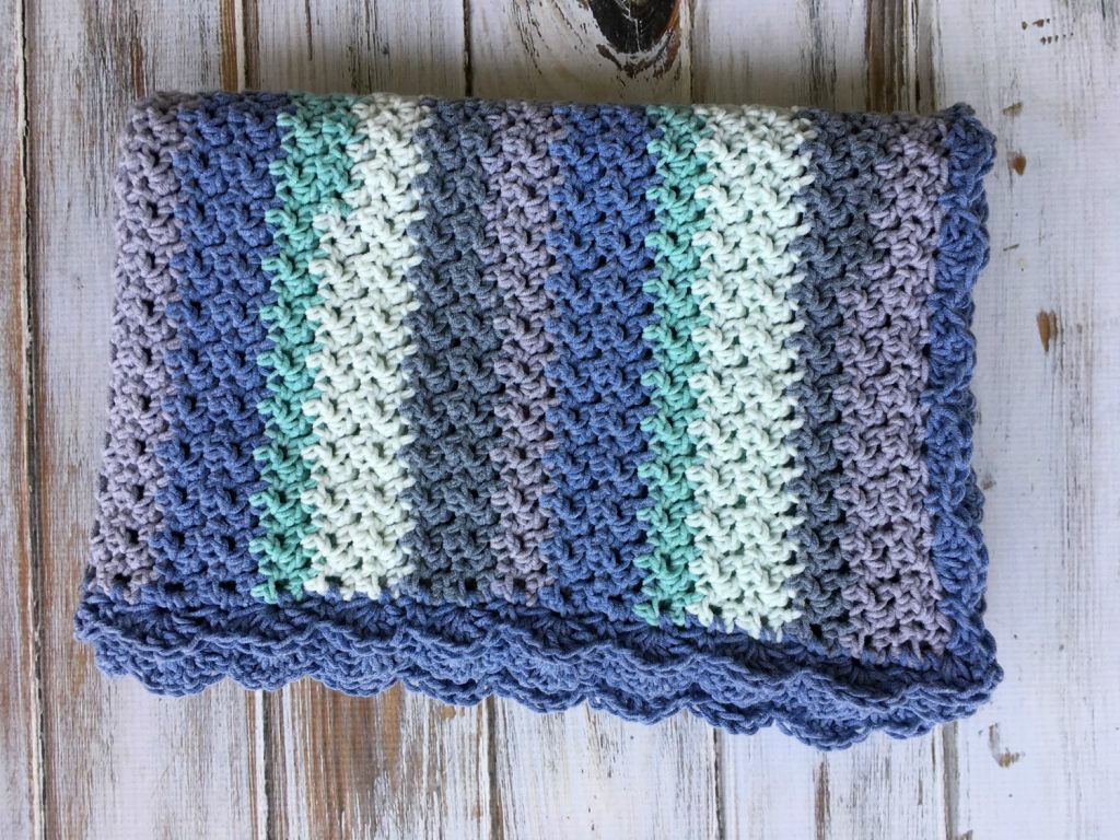 This amazing baby blanket is made from only sc and dc! It's so easy and elegant - and a FREE crochet pattern!