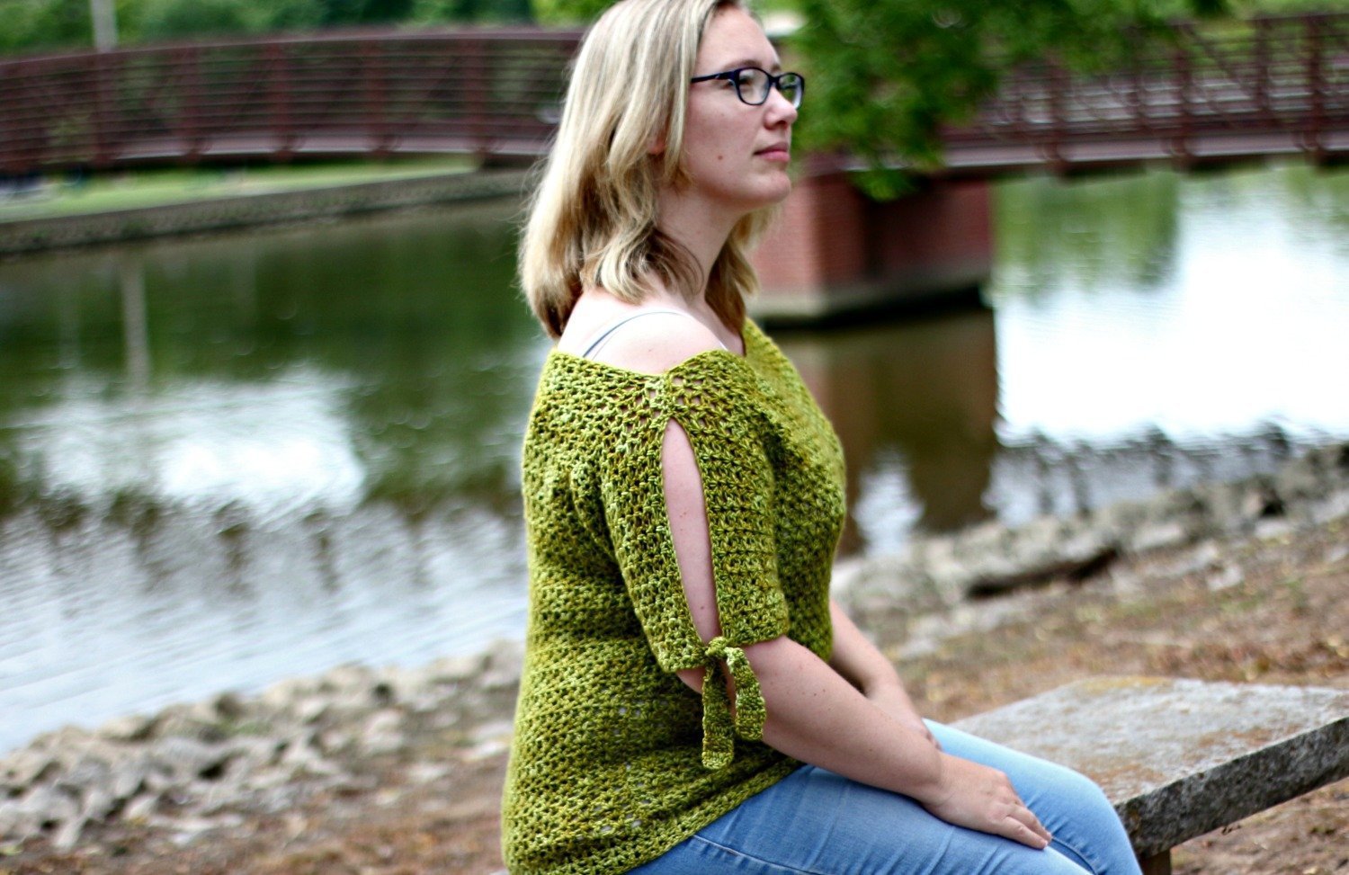 Use this free crochet pattern for the Tie Sleeve Tee to crochet a cold shoulder sweater with tie detailing!