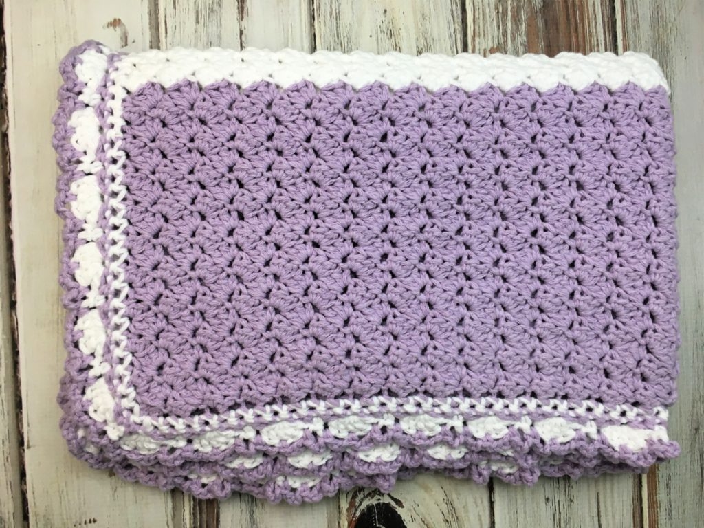 Free crochet pattern with close up video tutorial for the Lilac Meadow Baby Blanket!