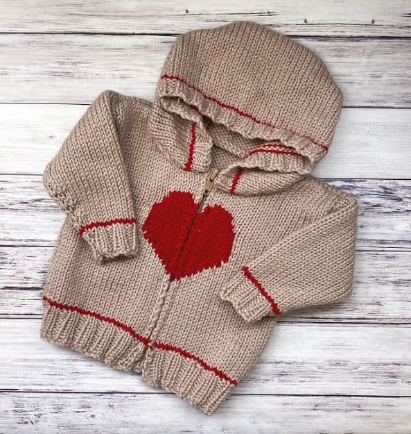Valentine Baby Cardigan Knitting Pattern lying flat