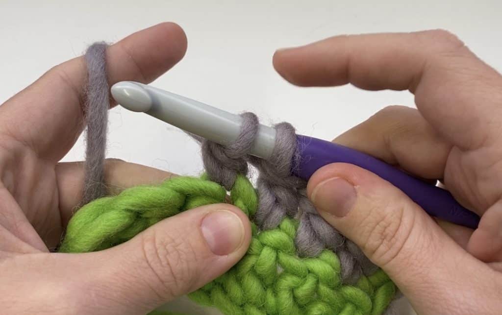 step two in a double crochet decrease