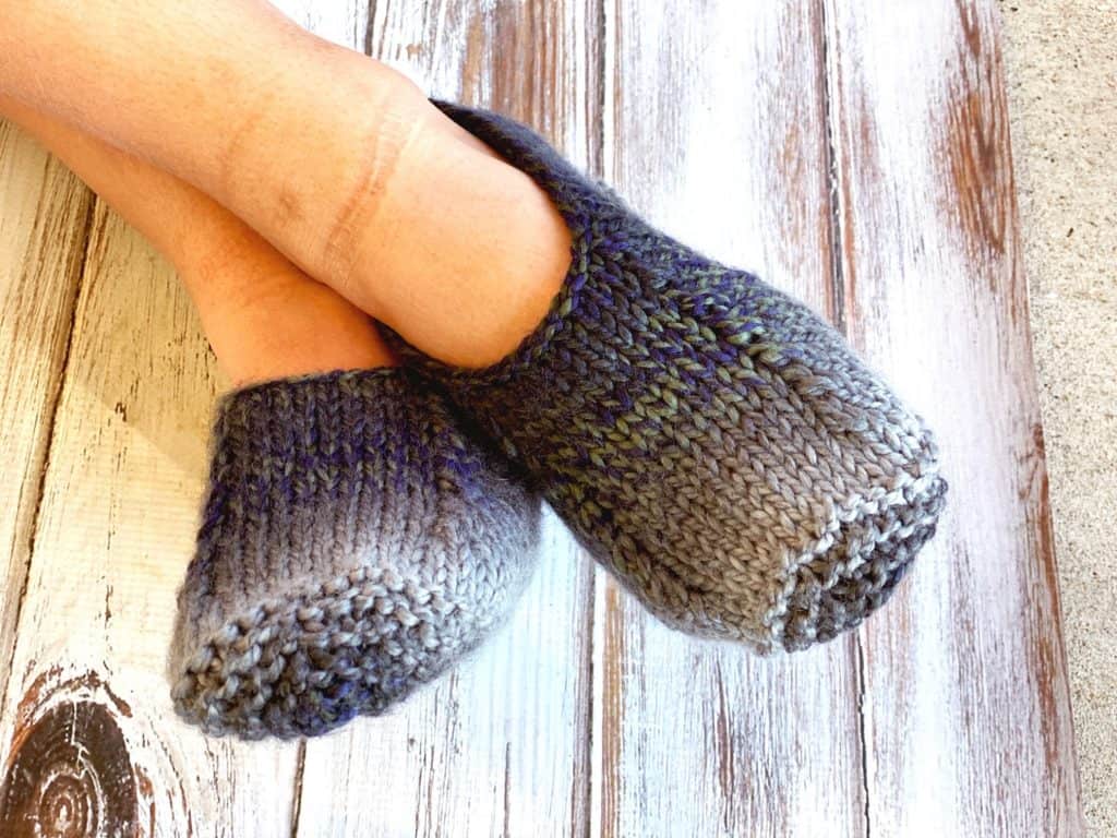 a feet wearing Gemstone Knit Slippers