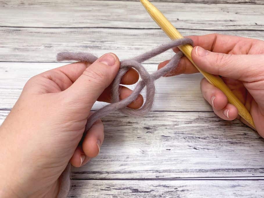 tying a knitting slip knot around needle