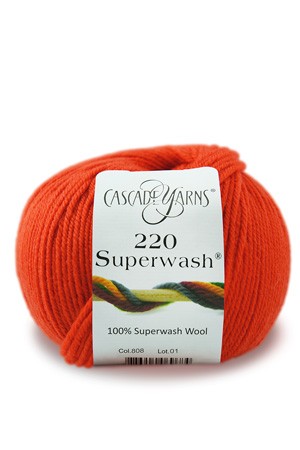 red orange skein of cascade yarns 220 superwash